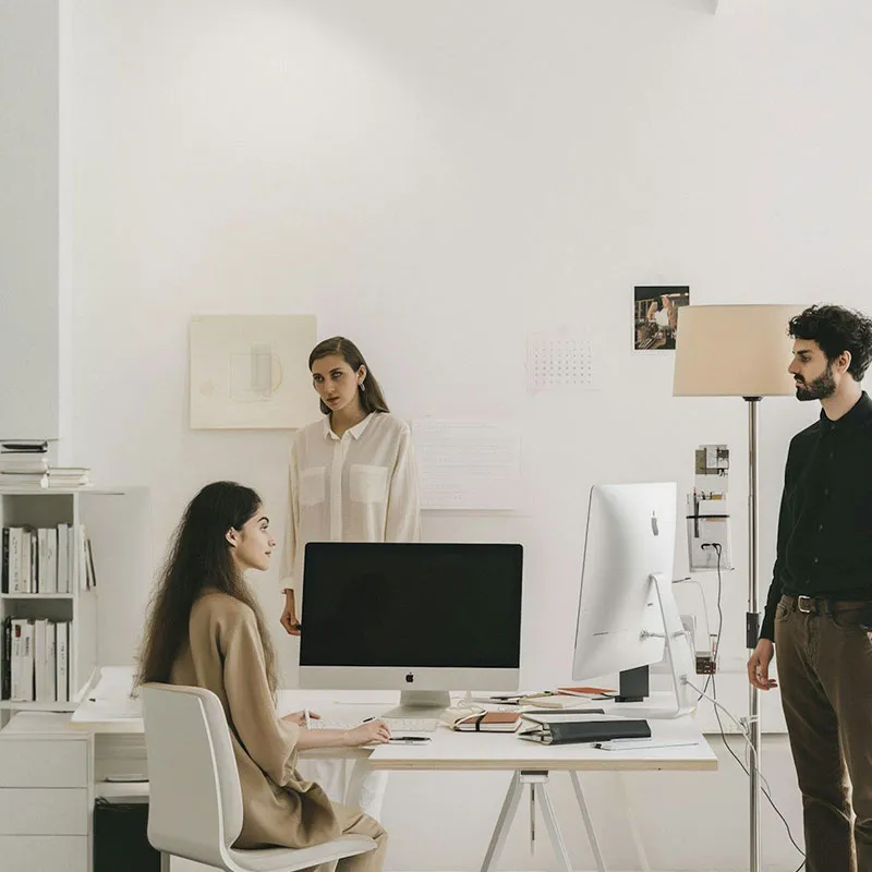 Team members collaborating in the Hillnut studio